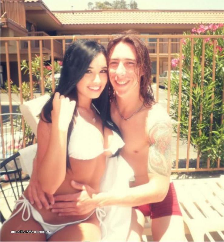 14P Gorgeous camwhoring busty babe shows off in a white bikini