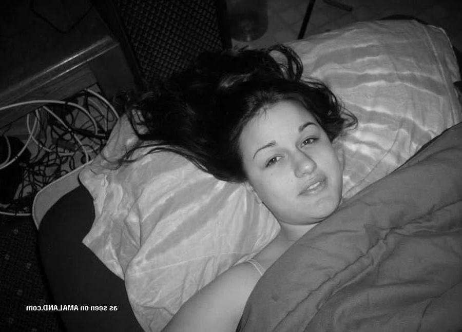 15P Pictures of a busty amateur chick in black and white