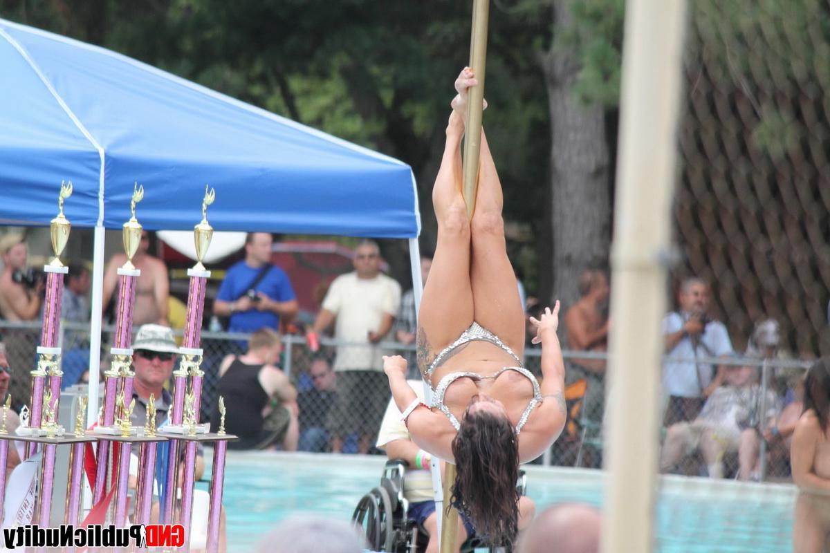 12P Pictures of girls flashing the camera at a public nudity party outdoors