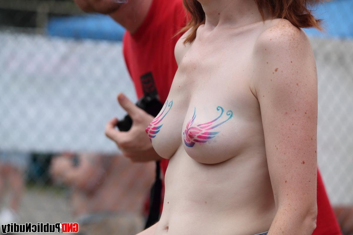 12P Pictures of girls flashing the camera at a public nudity party outdoors