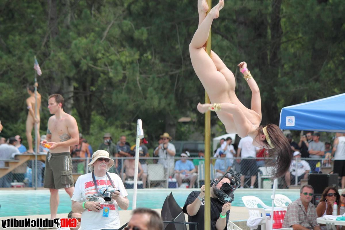 12P Strippers showing off their skills on the pole at an outdoor party