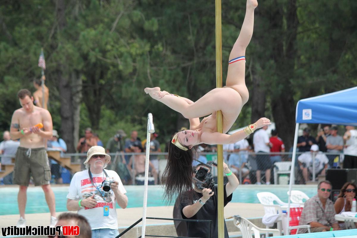 12P Strippers showing off their skills on the pole at an outdoor party