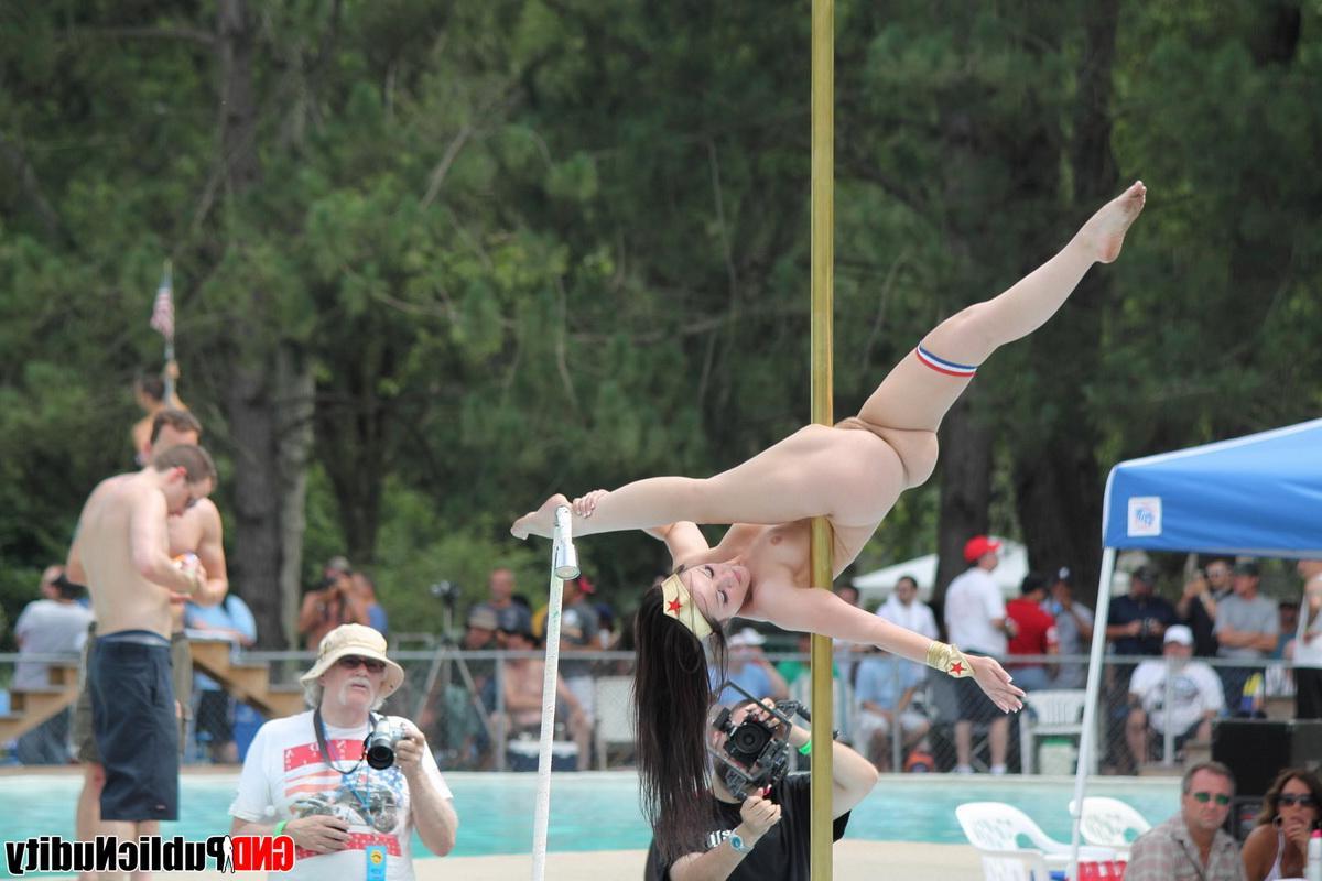 12P Strippers showing off their skills on the pole at an outdoor party