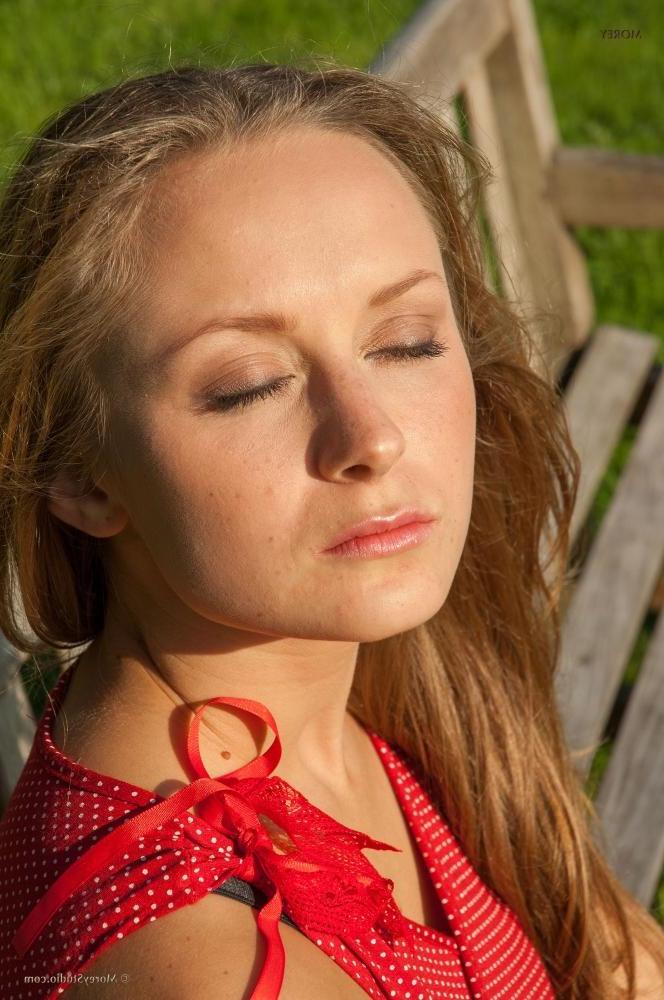 10P Brunette girl Klara shows you what's up her dress on a park bench