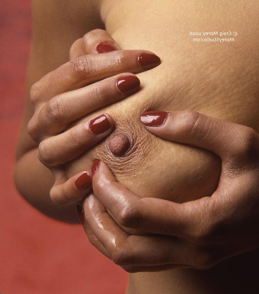 12P Busty babe Natalie shows off her curvy body in the studio