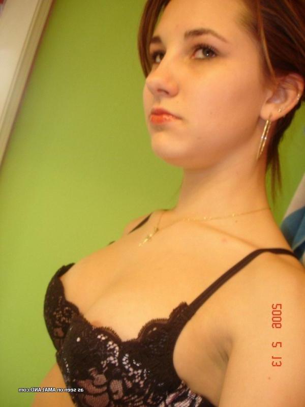 14P Redhead chick self-shooting in sexy clothes and lingerie