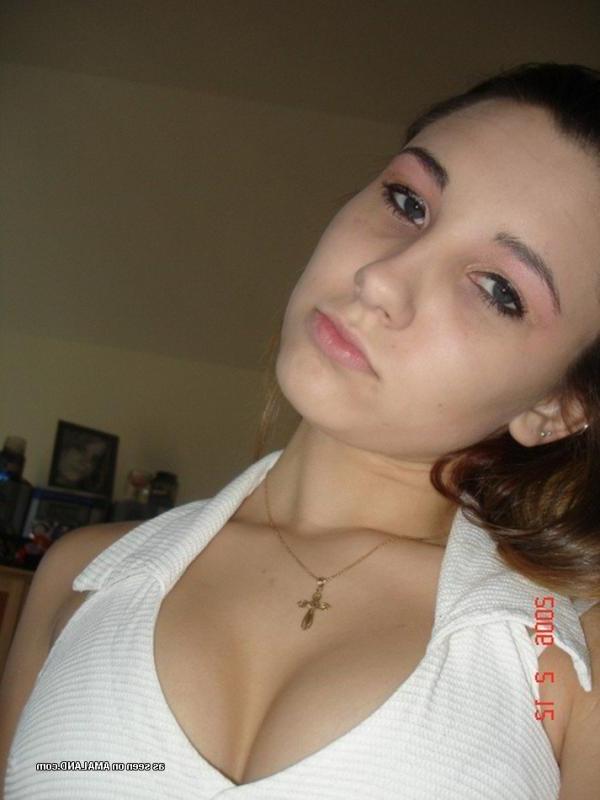 14P Redhead chick self-shooting in sexy clothes and lingerie