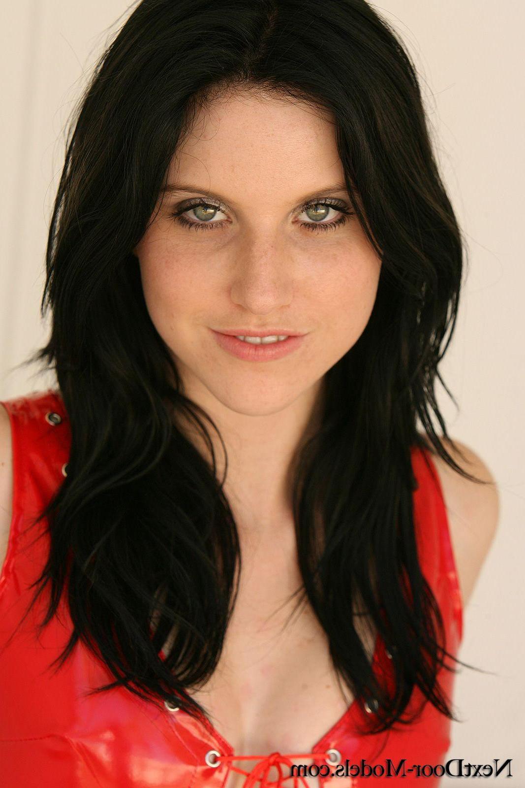13P Pictures of a brunette beauty teasing in a red dress