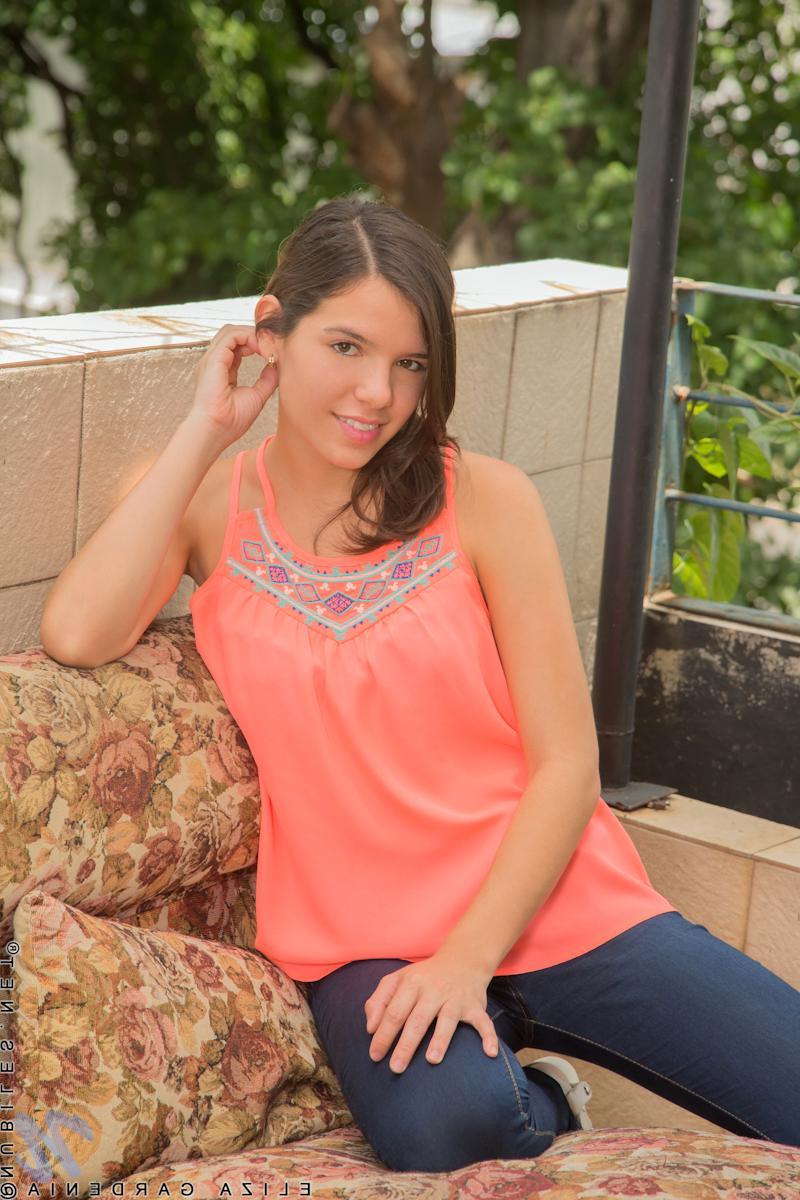 15P Brunette girl Eliza Gardenia strips naked and plays with herself