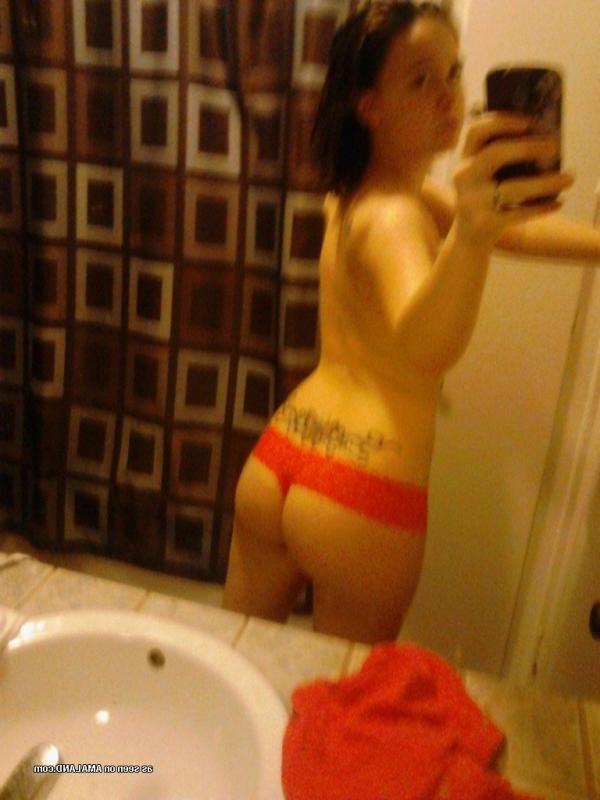 15P Horny brunette babe shows her breasts and pussy