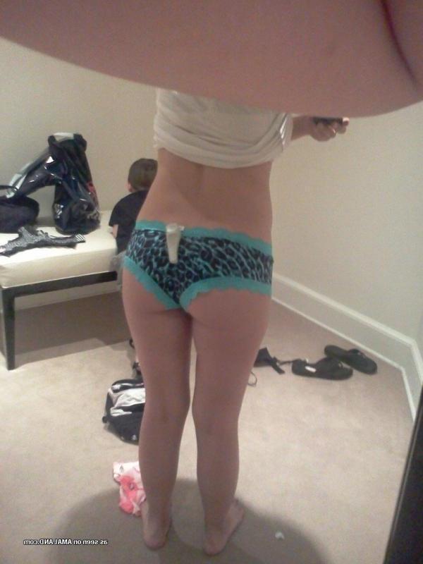 15P Horny brunette babe shows her breasts and pussy