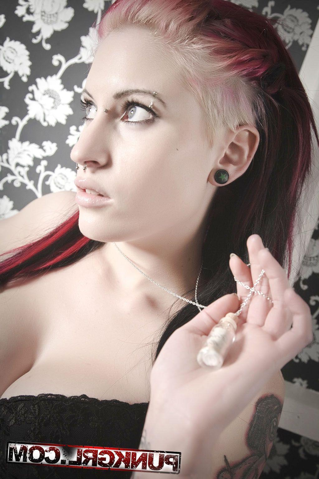 16P Pictures of Lullabye Blue showing her round boobs