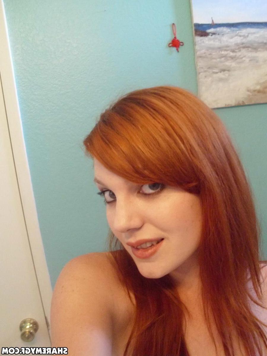 11P Sexy redhead teen takes selfshot pictures then plays with her cute perky friend