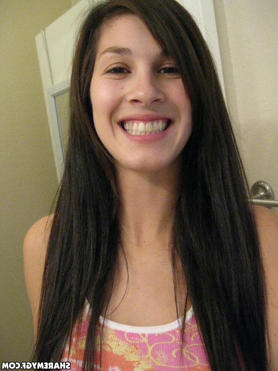 20P Busty brunette coed takes pics of her round tits and ass