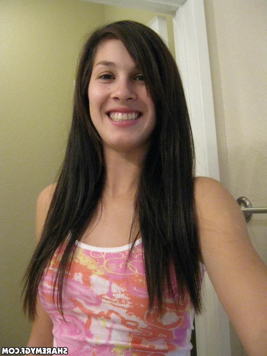 20P Busty brunette coed takes pics of her round tits and ass