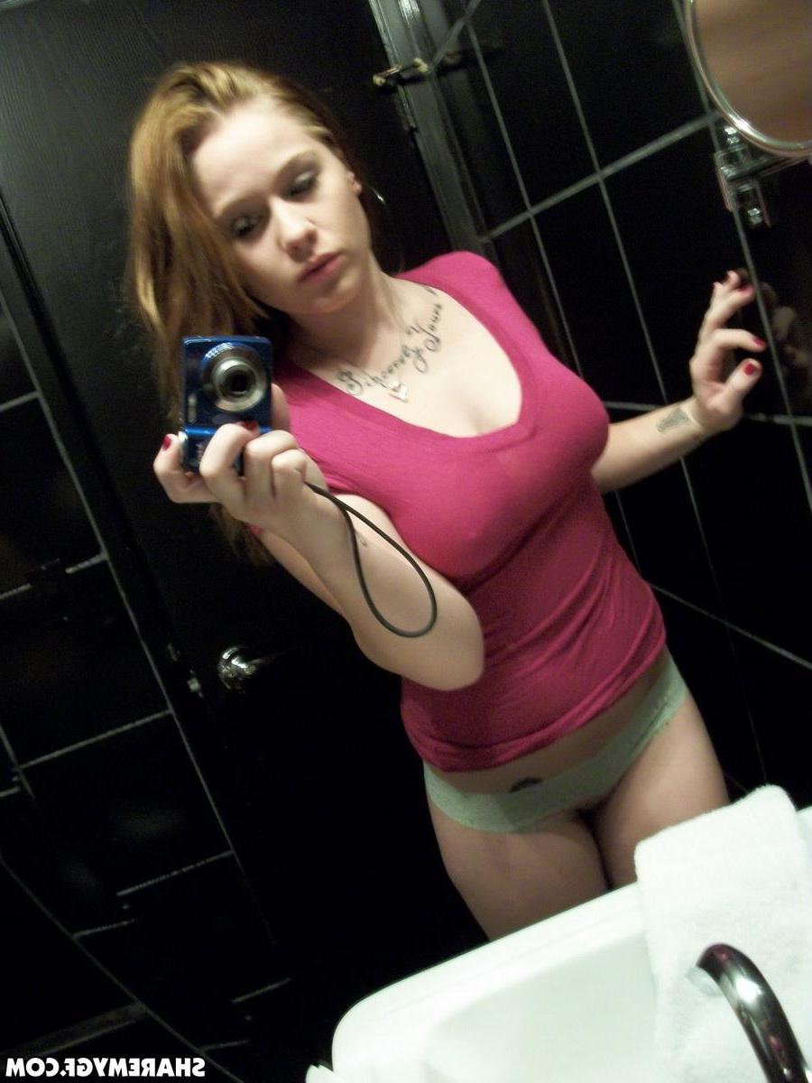 20P Busty redhead GF takes selfies of her tits and ass