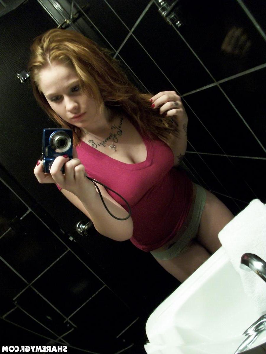 20P Busty redhead GF takes selfies of her tits and ass