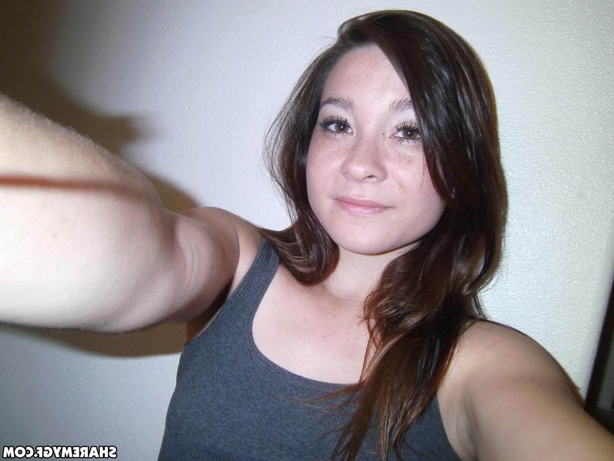 20P Hot brunette coed takes selfies her perky boobs and round ass