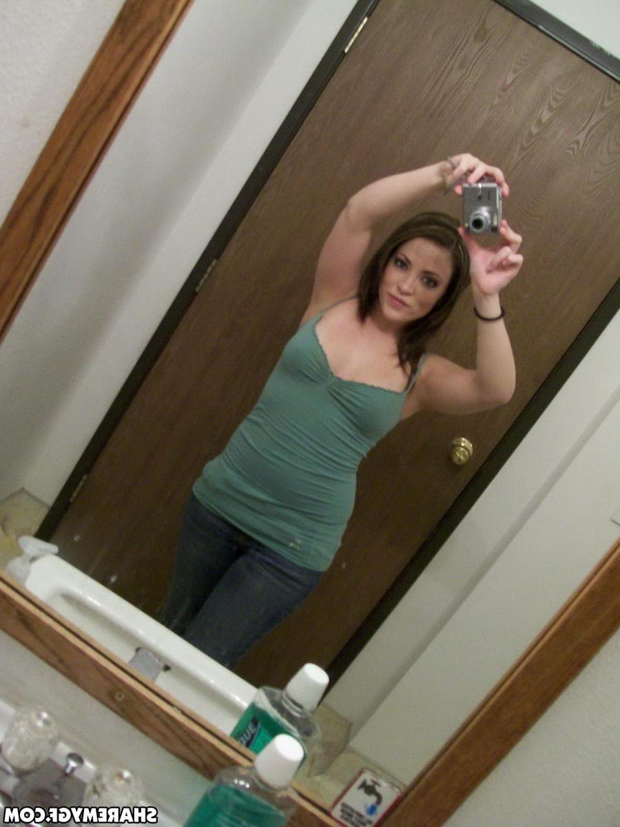 20P Hot brunette girlfriend takes sexy pics of her tits and pussy