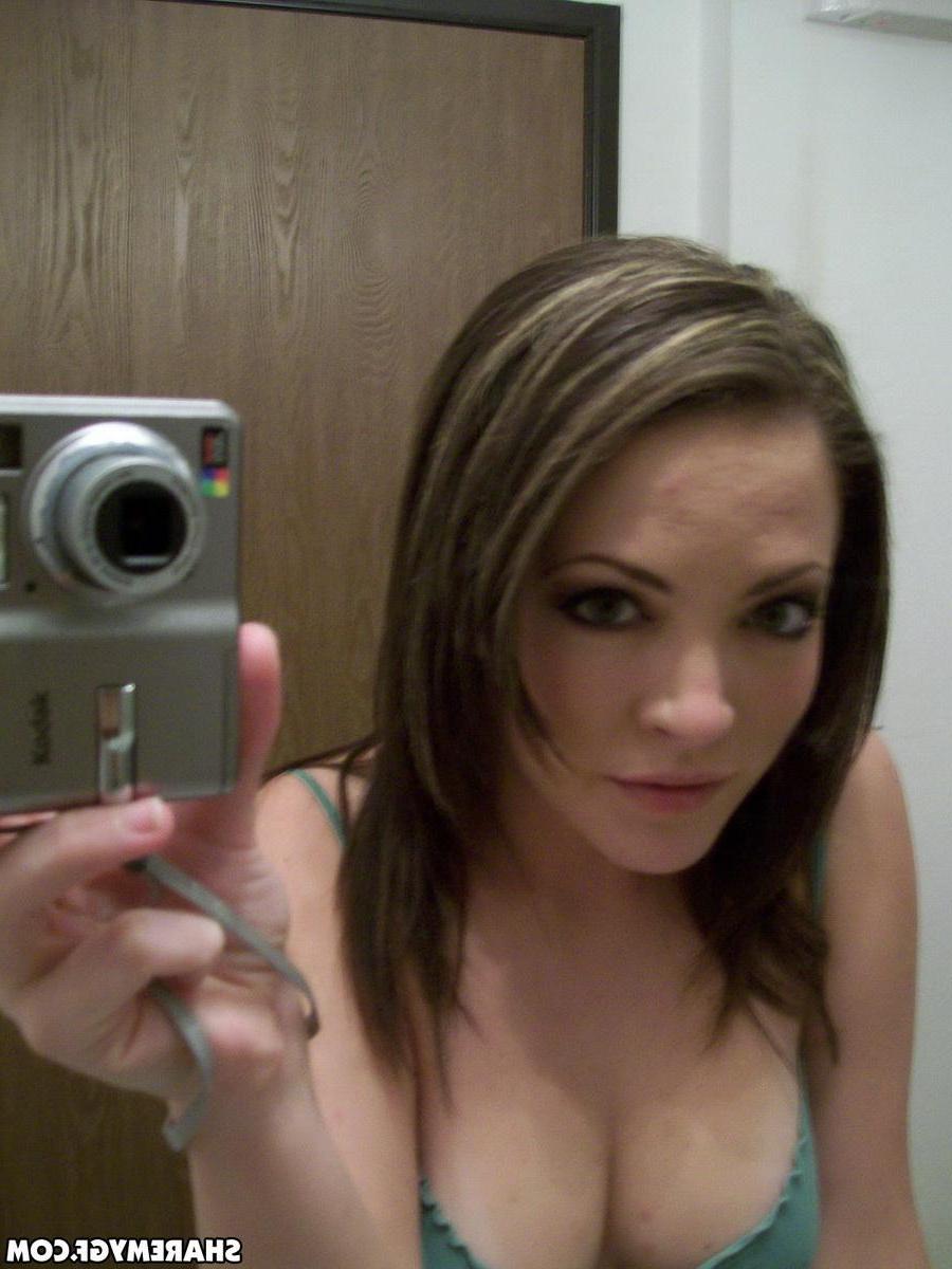 20P Hot brunette girlfriend takes sexy pics of her tits and pussy