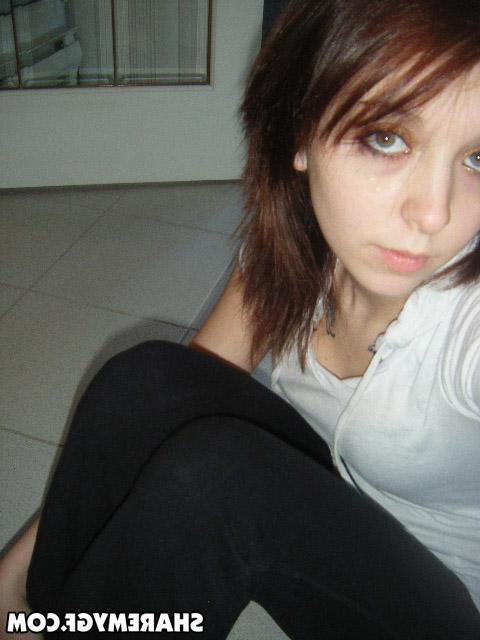 20P Sexy brunette girl takes pics of herself in her socks