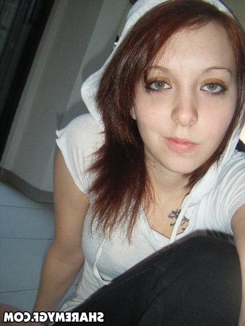 20P Sexy brunette girl takes pics of herself in her socks