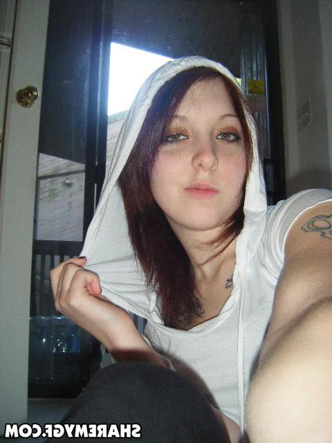 20P Sexy brunette girl takes pics of herself in her socks