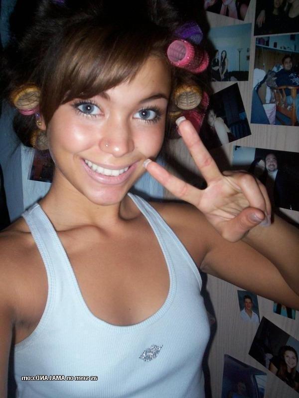 14P Pictures of a stunning brunette teen showing her hot body