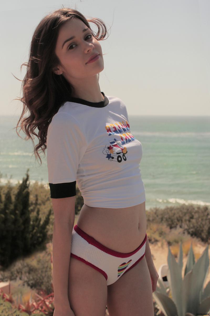 16P Hot rollergirl Selena Storm slips out of her panties and masturbates in bed