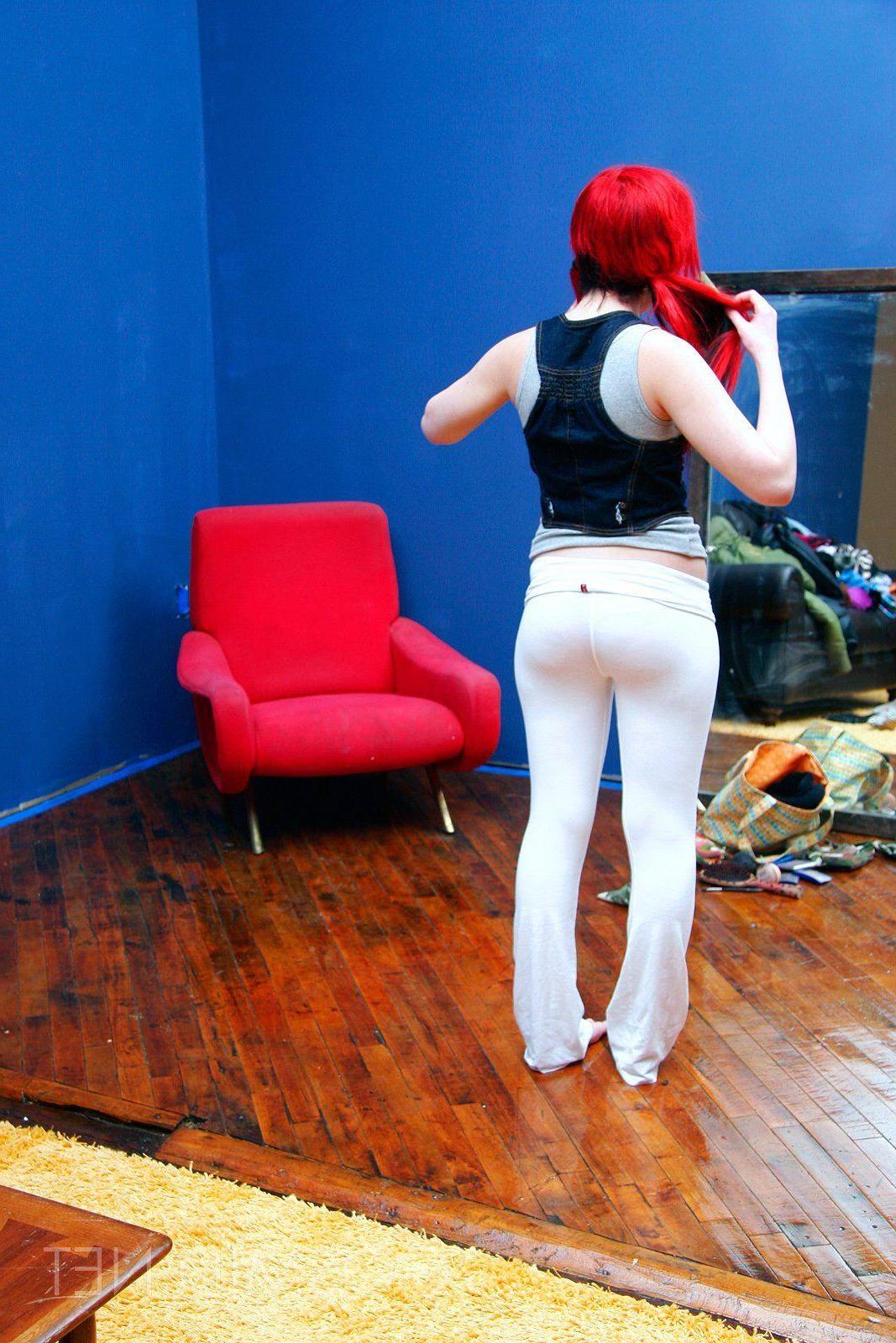 16P Pictures of a redhead beauty showing her big tits