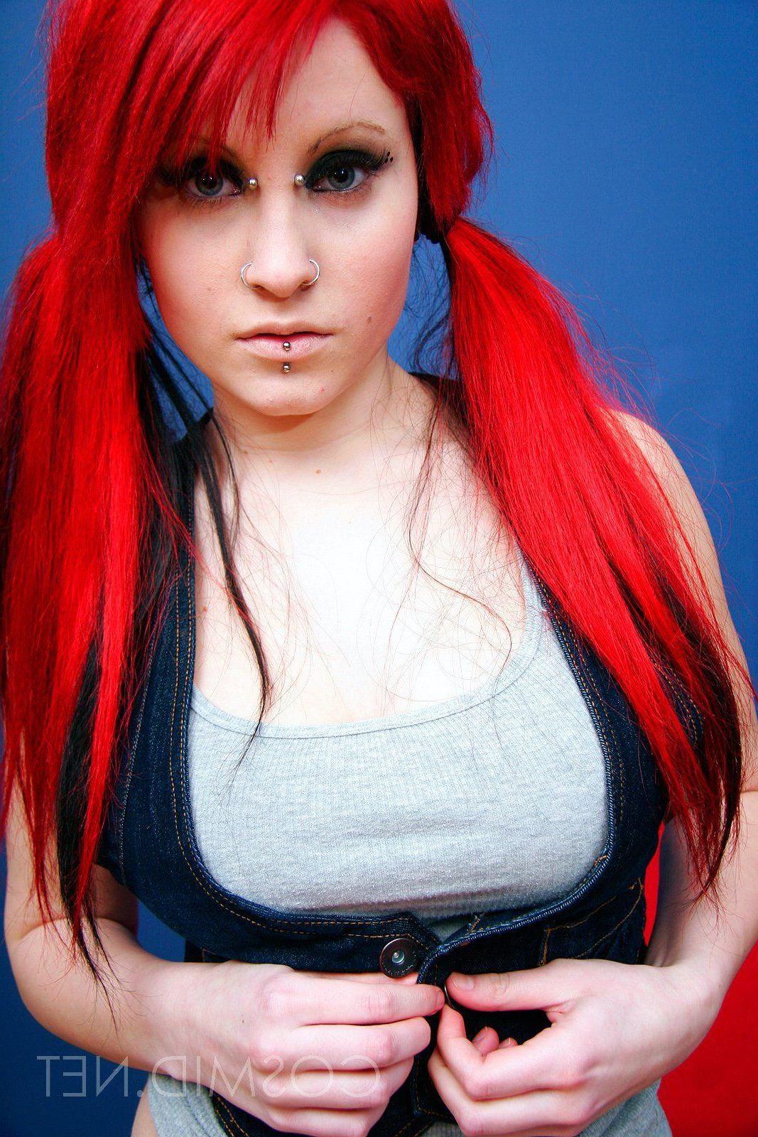 16P Pictures of a redhead beauty showing her big tits