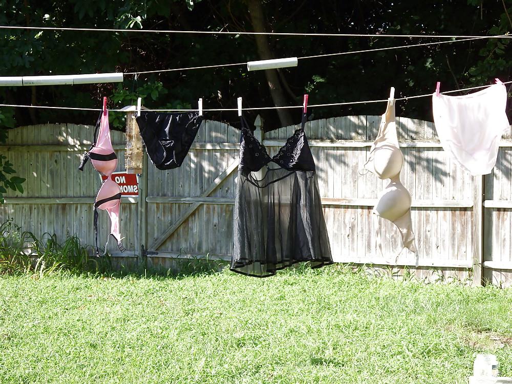 12P LINGERIE ON THE LINE FOR THE NEIGHBORS TO SEE.