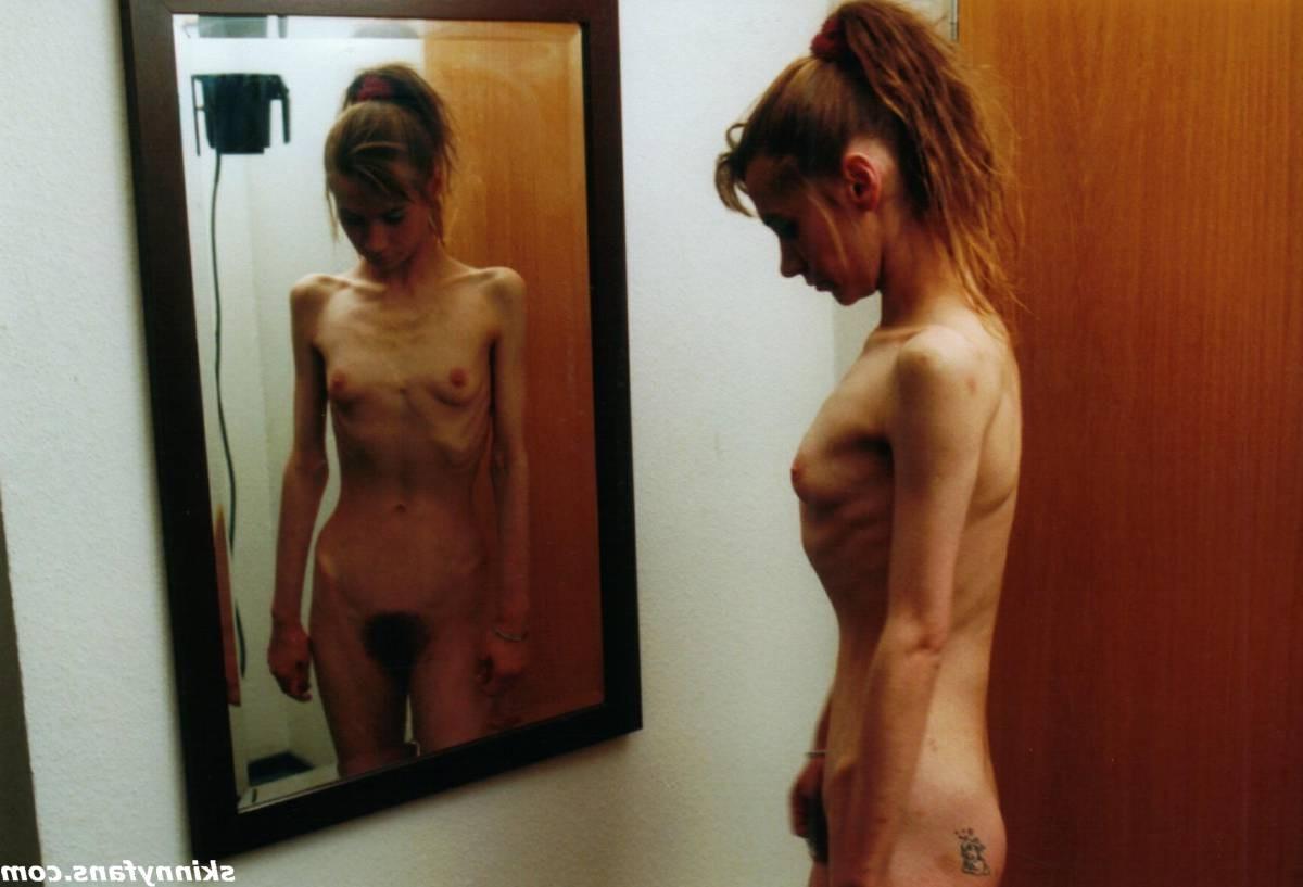 16P A skinny girl posing naked for food