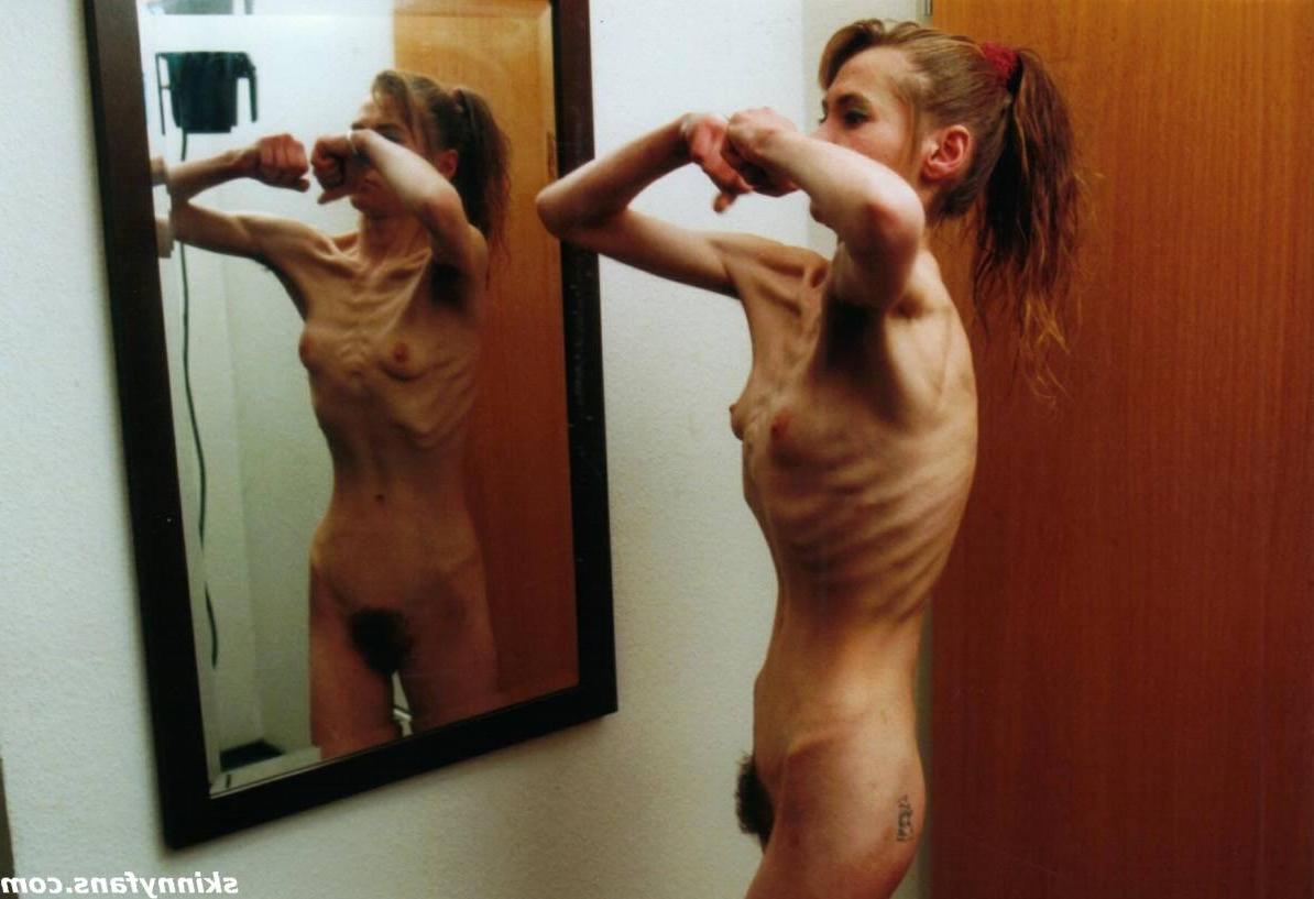 16P A skinny girl posing naked for food