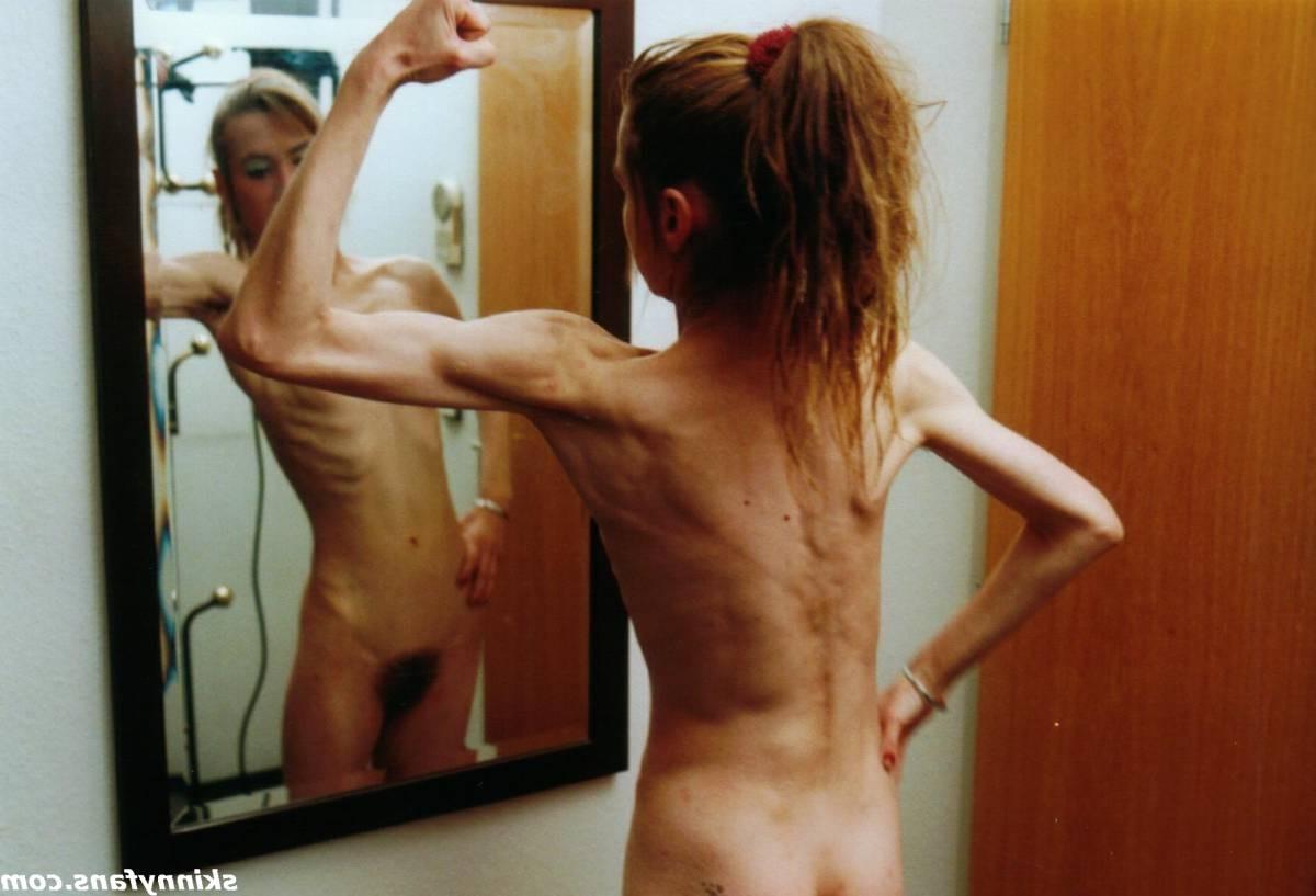 16P A skinny girl posing naked for food