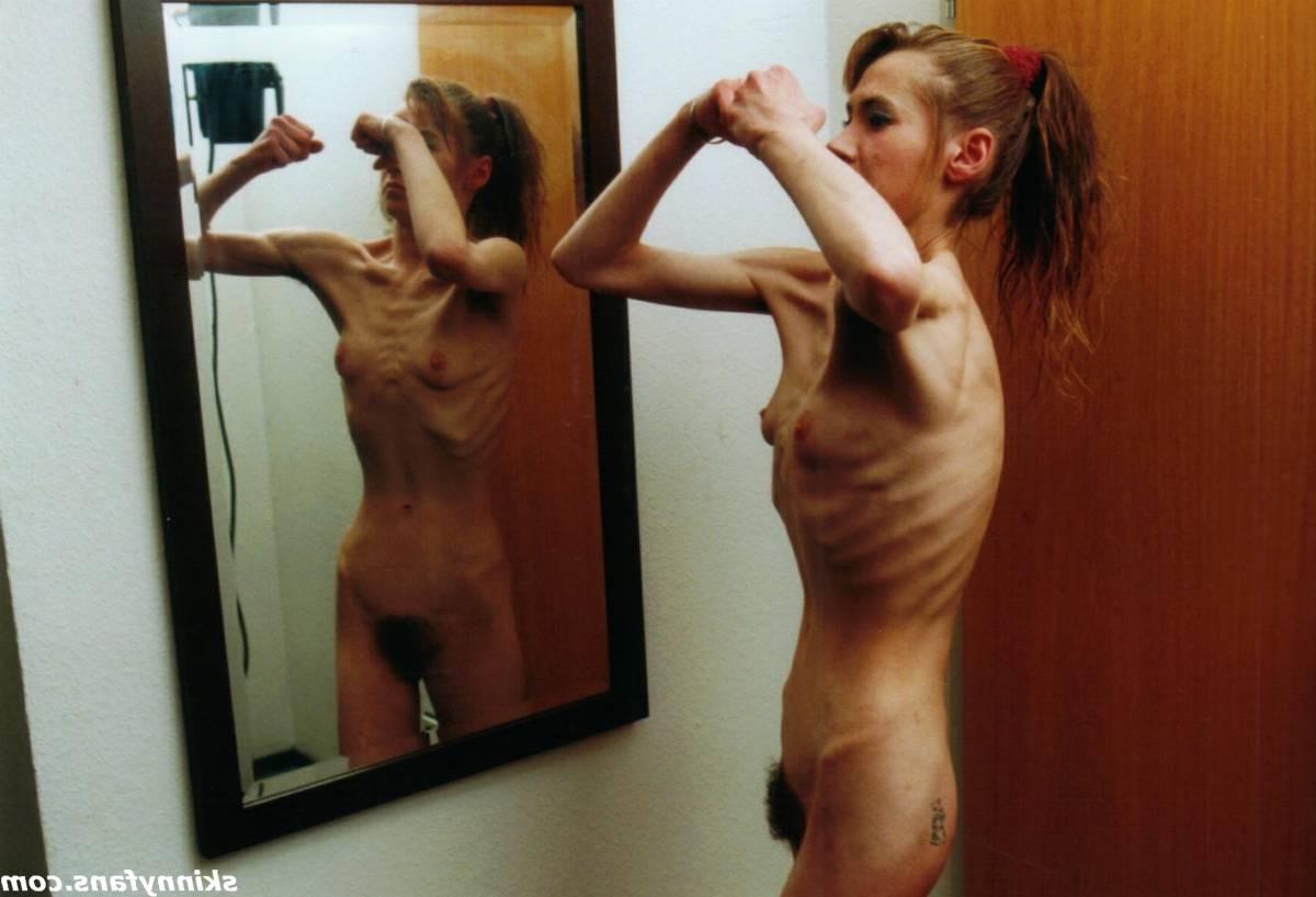 16P A skinny girl posing naked for food
