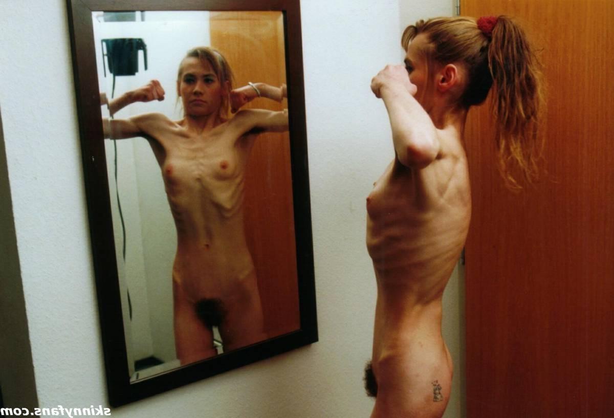 16P A skinny girl posing naked for food