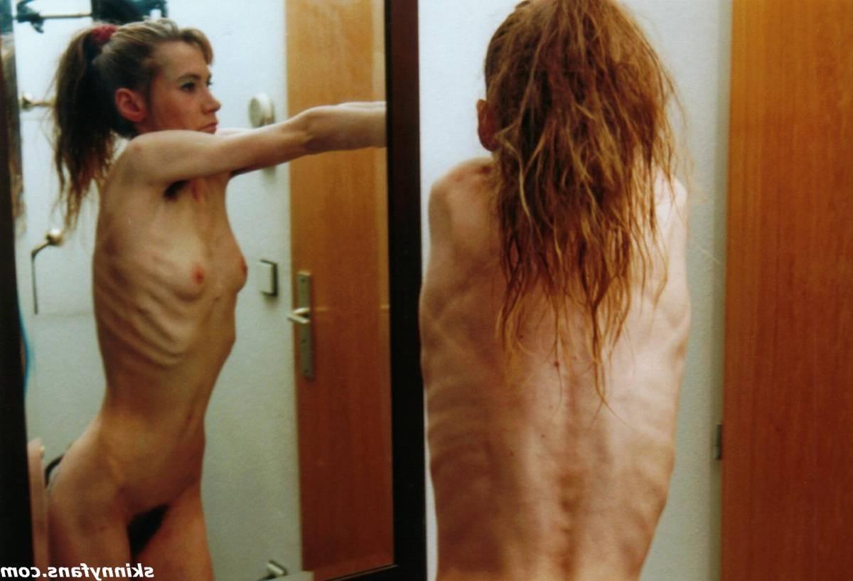 16P A skinny girl posing naked for food