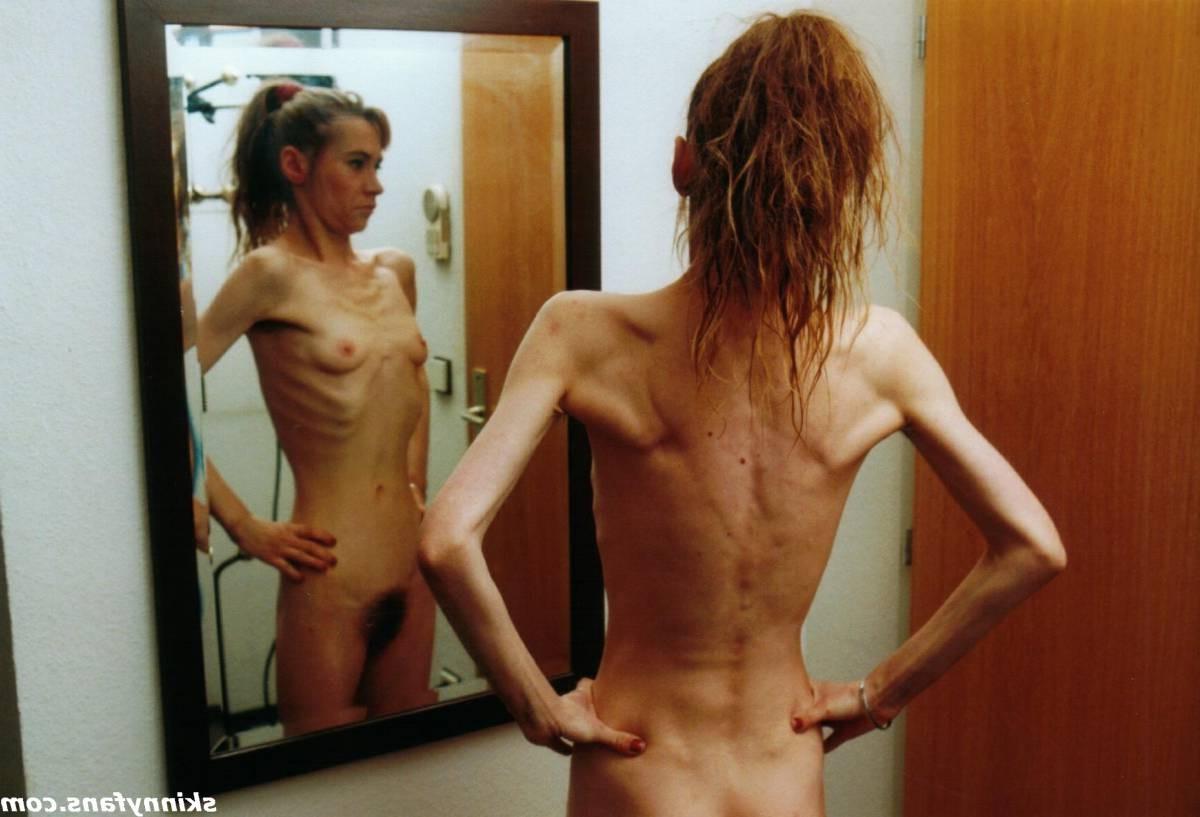 16P A skinny girl posing naked for food