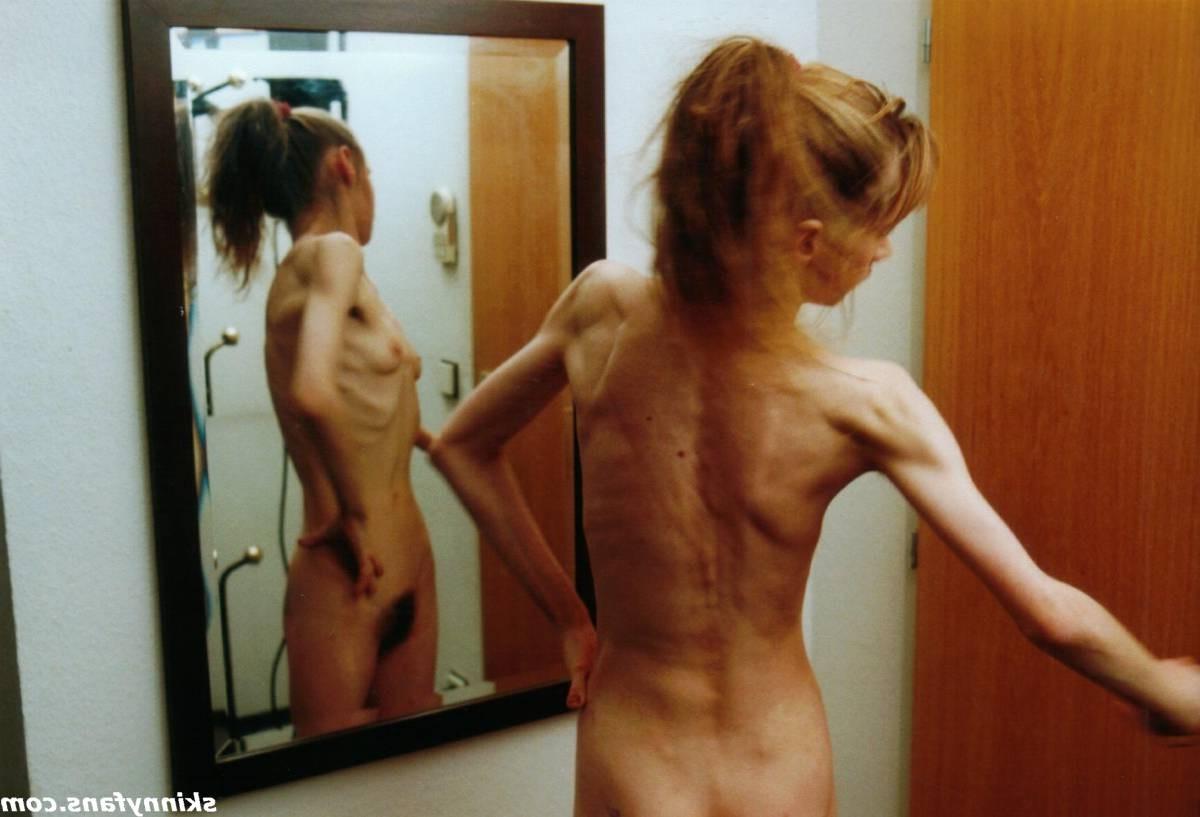 16P A skinny girl posing naked for food