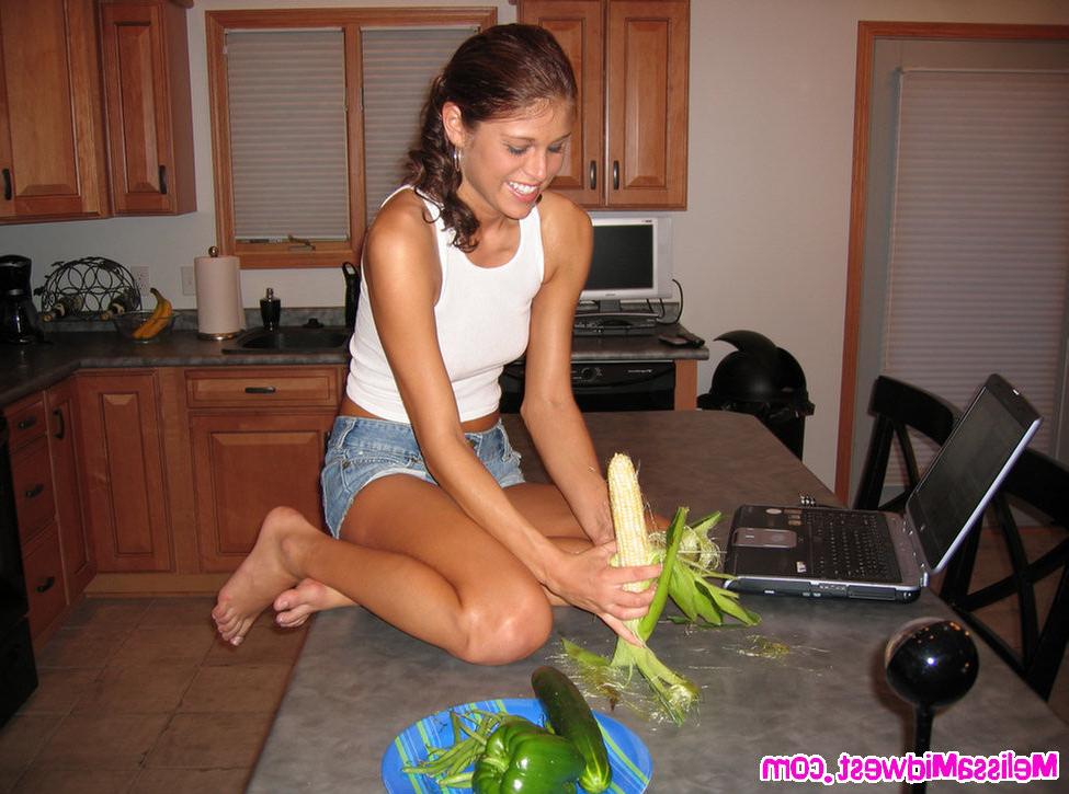 15P Melissa Midwest playing with food on the counter