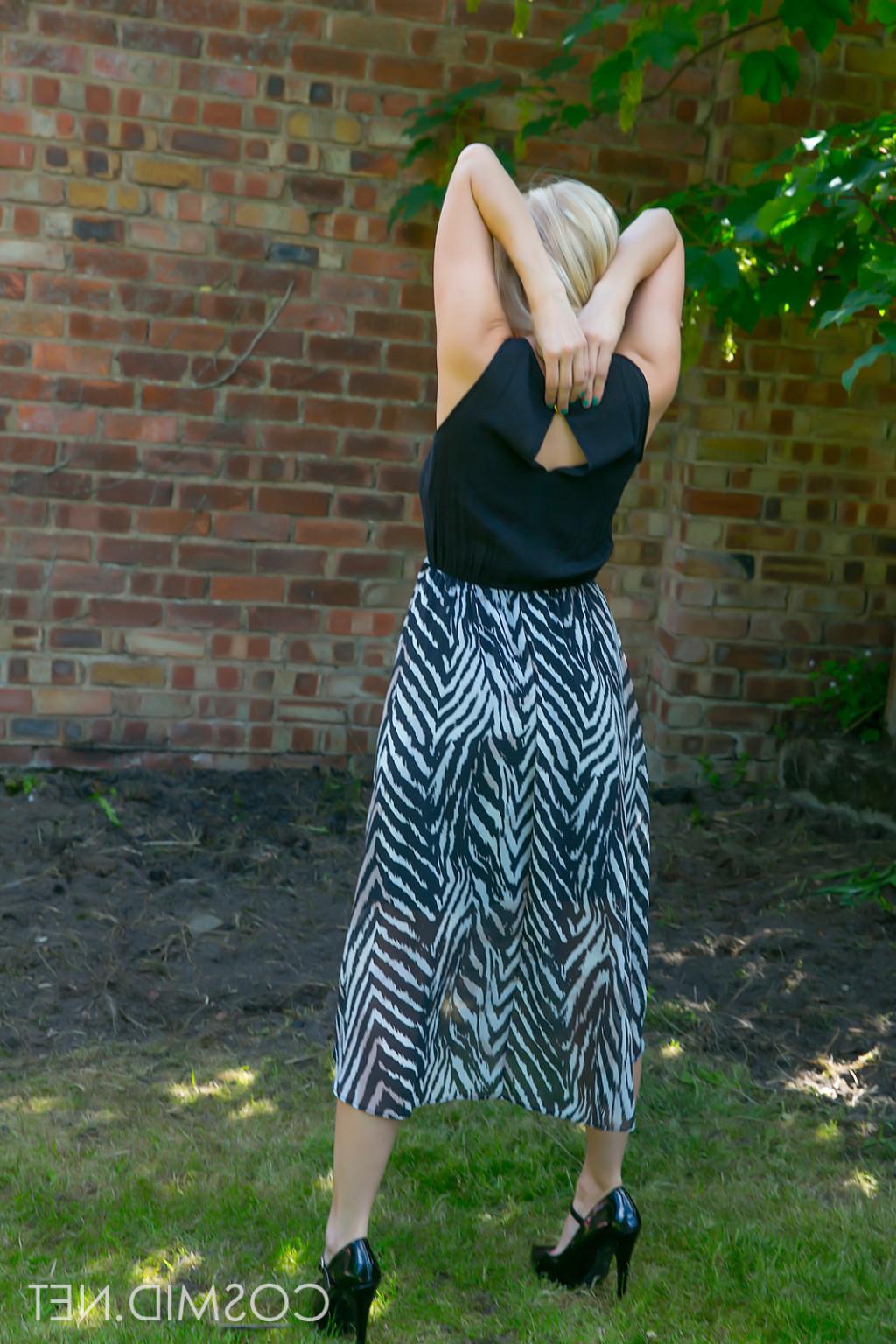 16P Cute blonde with big boobies pulls her dress off outside