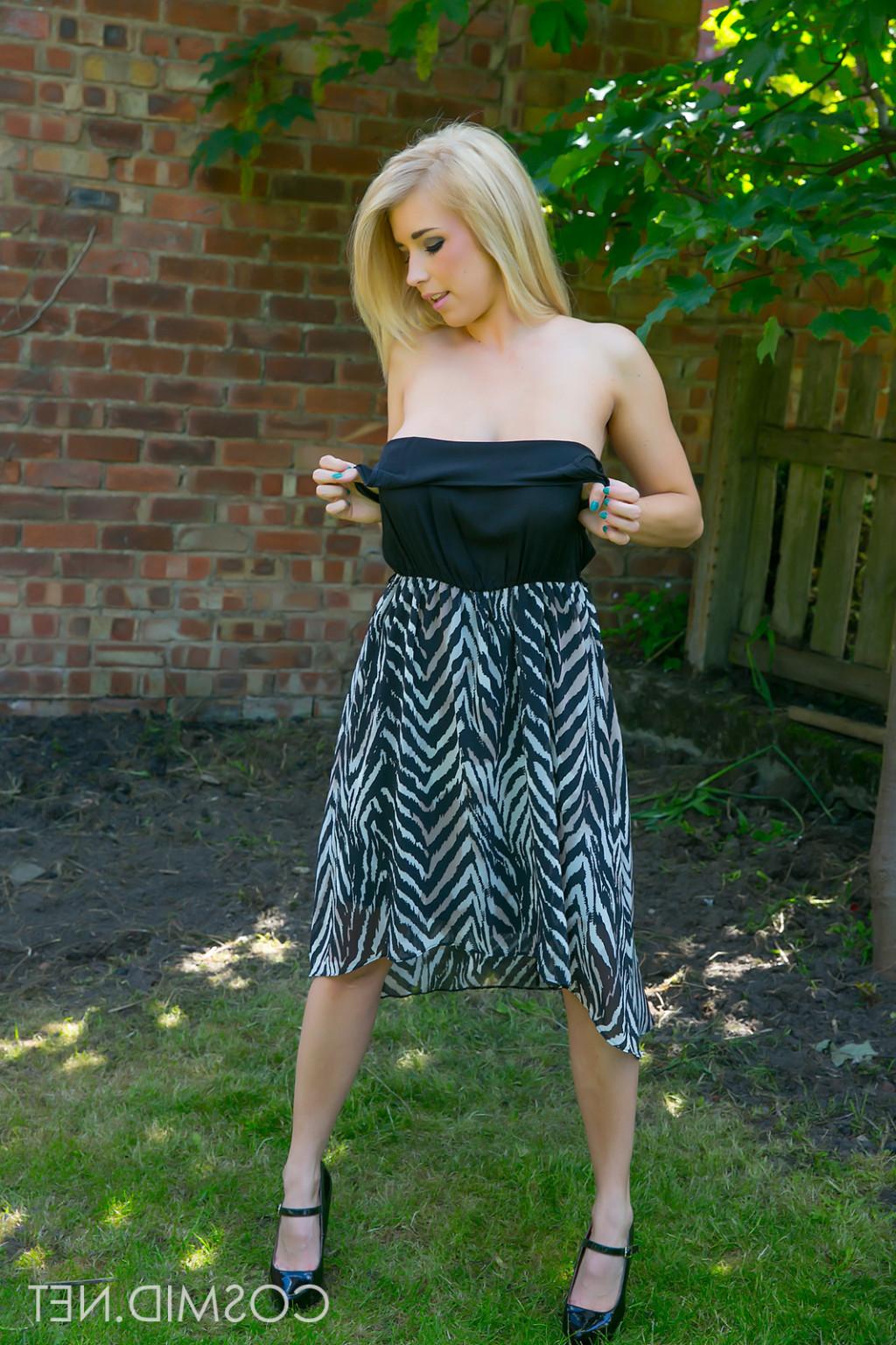 16P Cute blonde with big boobies pulls her dress off outside