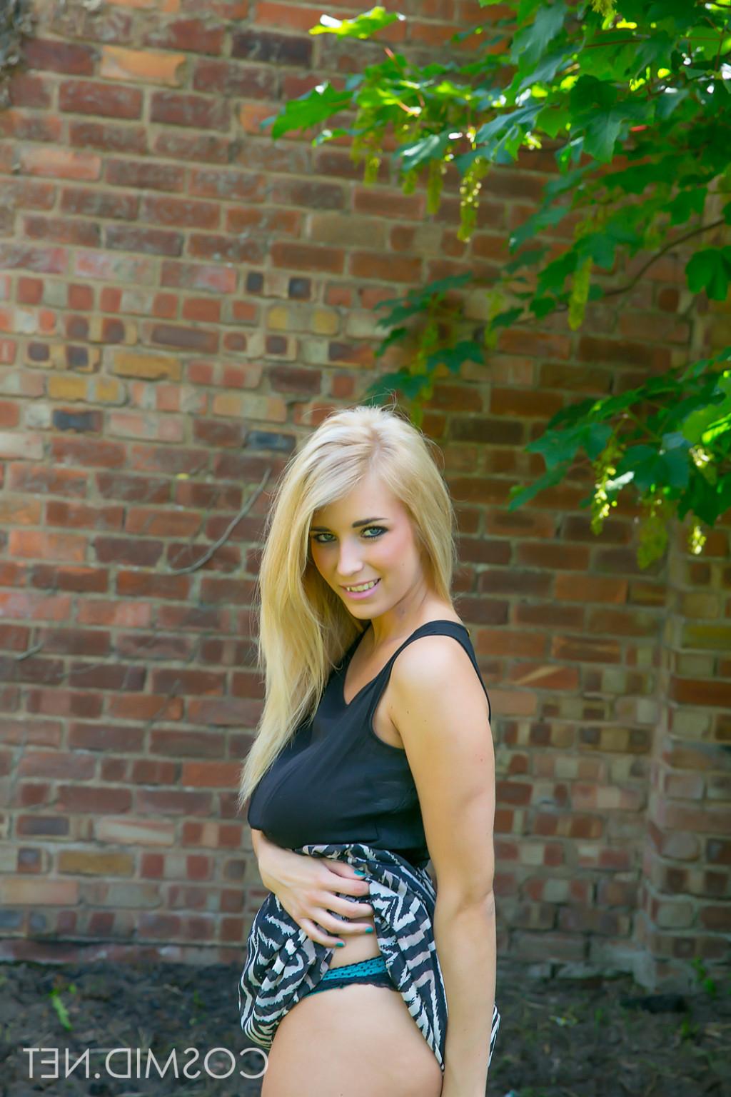16P Cute blonde with big boobies pulls her dress off outside