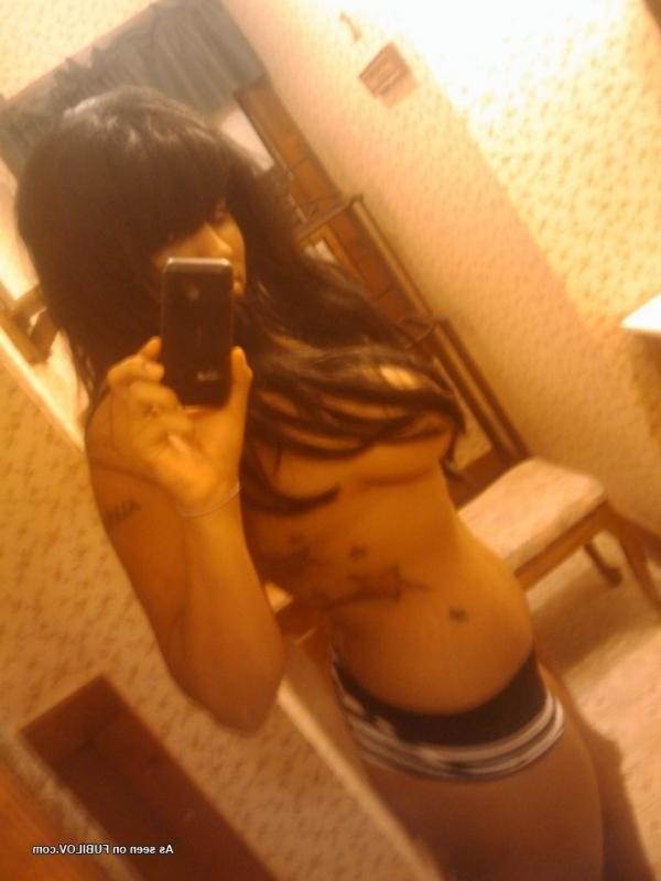 10P Hot photo compilation of a naughty black chick flashing her huge tits