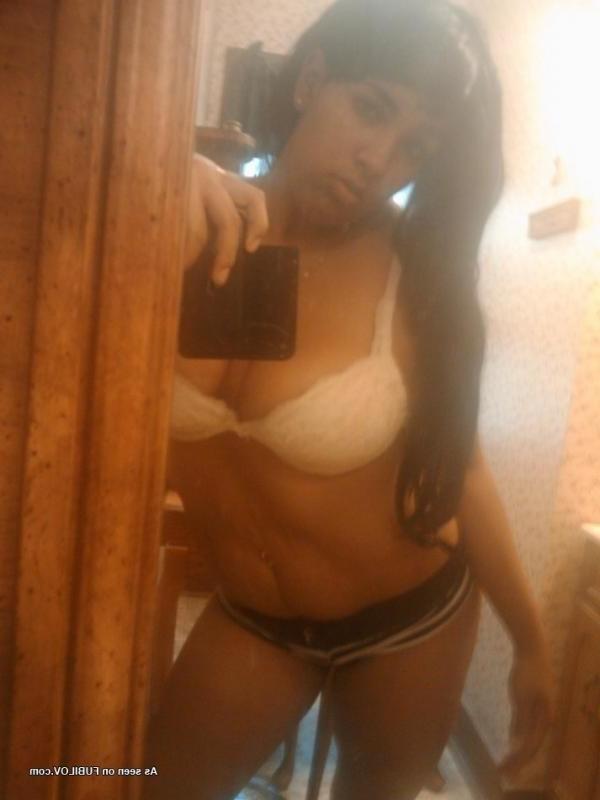 10P Hot photo compilation of a naughty black chick flashing her huge tits