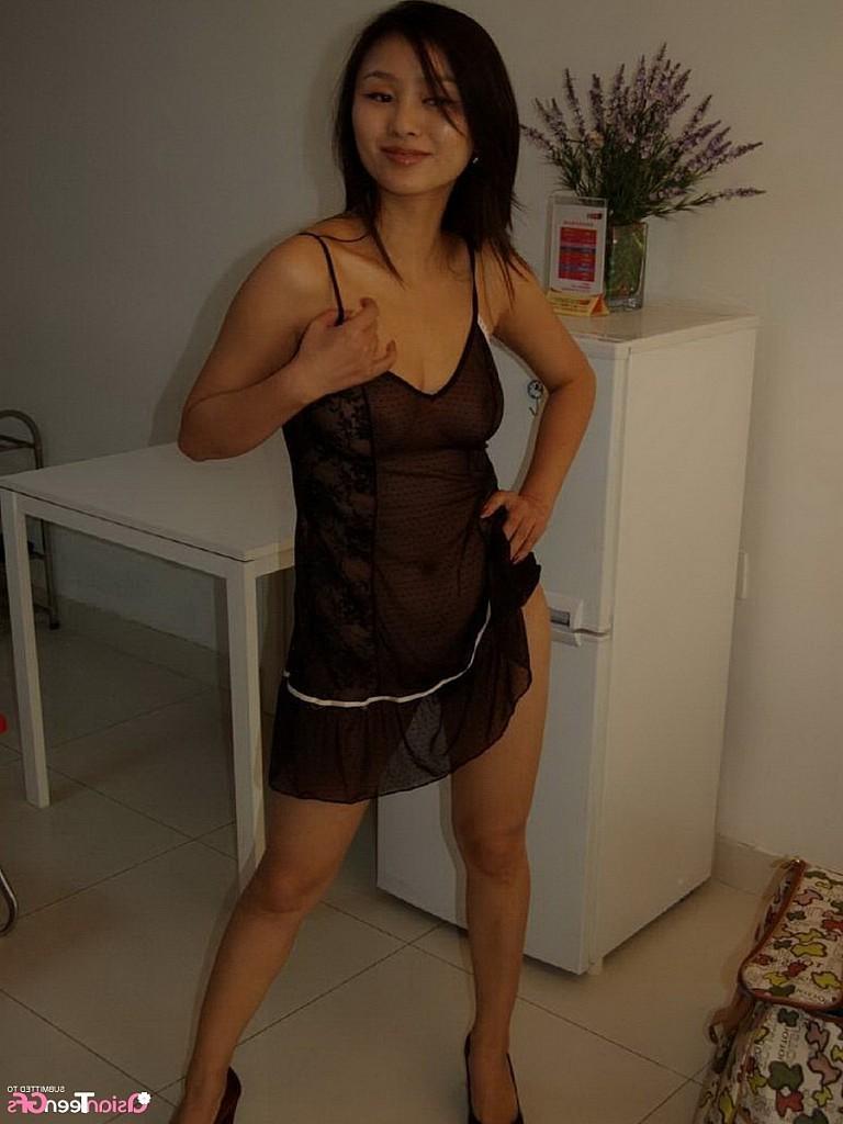 10P Pretty girl shows hairy pussy in kitchen