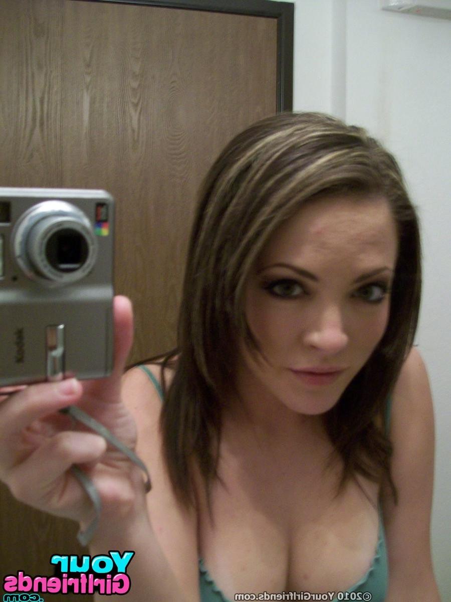 11P Carmen plays with her tits and pussy while taking some hot self pics.