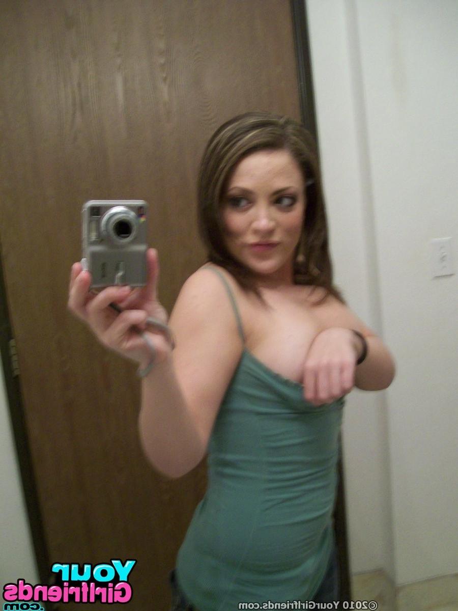 11P Carmen plays with her tits and pussy while taking some hot self pics.