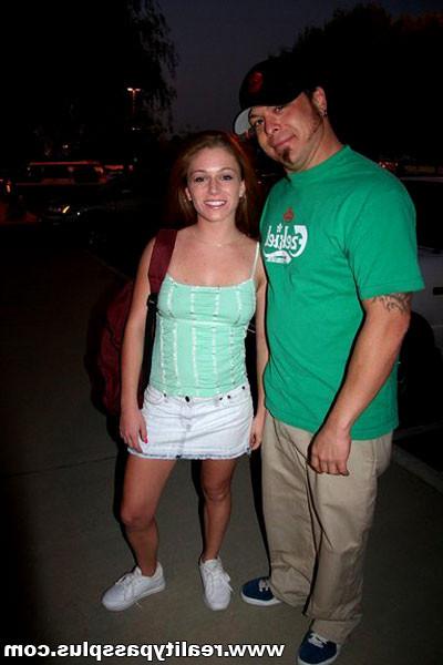 16P Sexy young redhead gets on her knees to suck off a hard reality dick